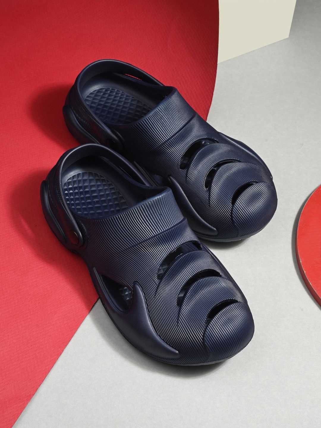 

HRX by Hrithik Roshan Men Navy Blue Self Design Croslite Clogs