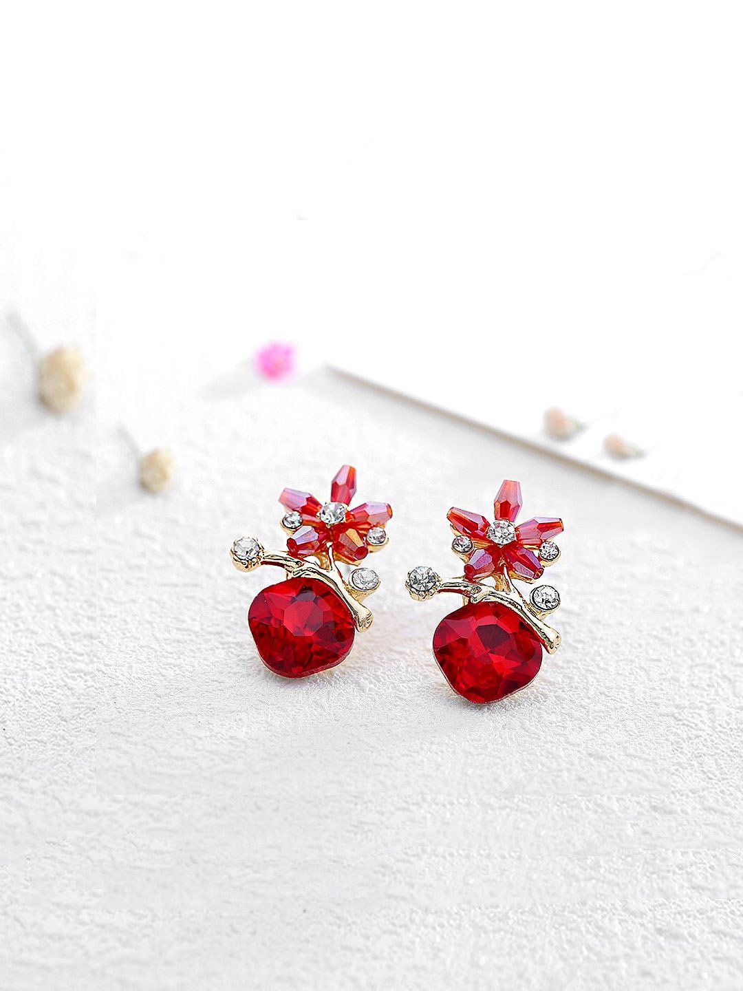 

Yellow Chimes Gold-Plated Floral Shaped Crystals Studded Studs Earrings