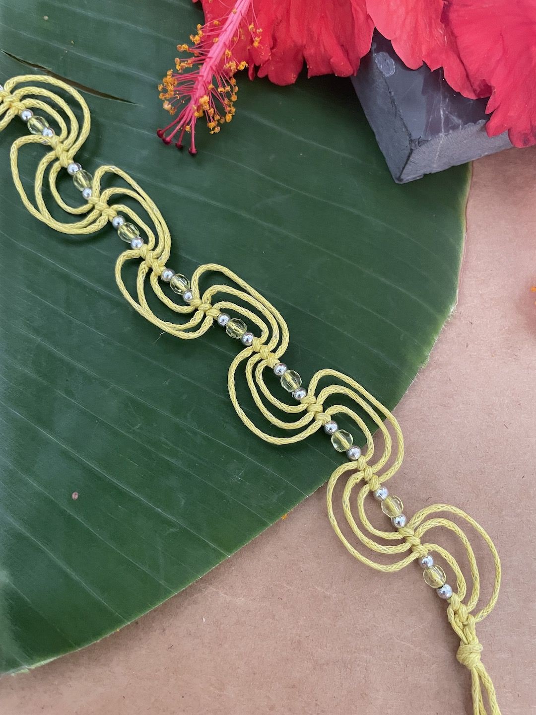 

Digital Dress Room Beaded Thread Rakhi, Yellow