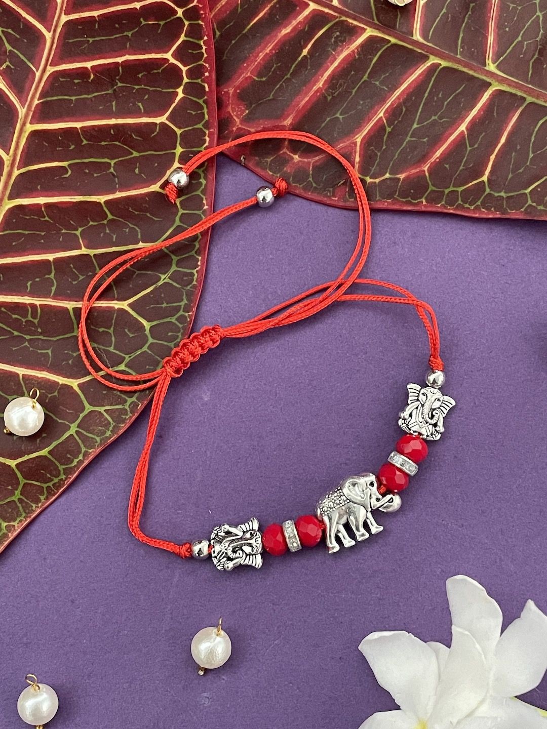 

Digital Dress Room Silver Plated Elephant & Lord Ganesha Thread Rakhi, Gold