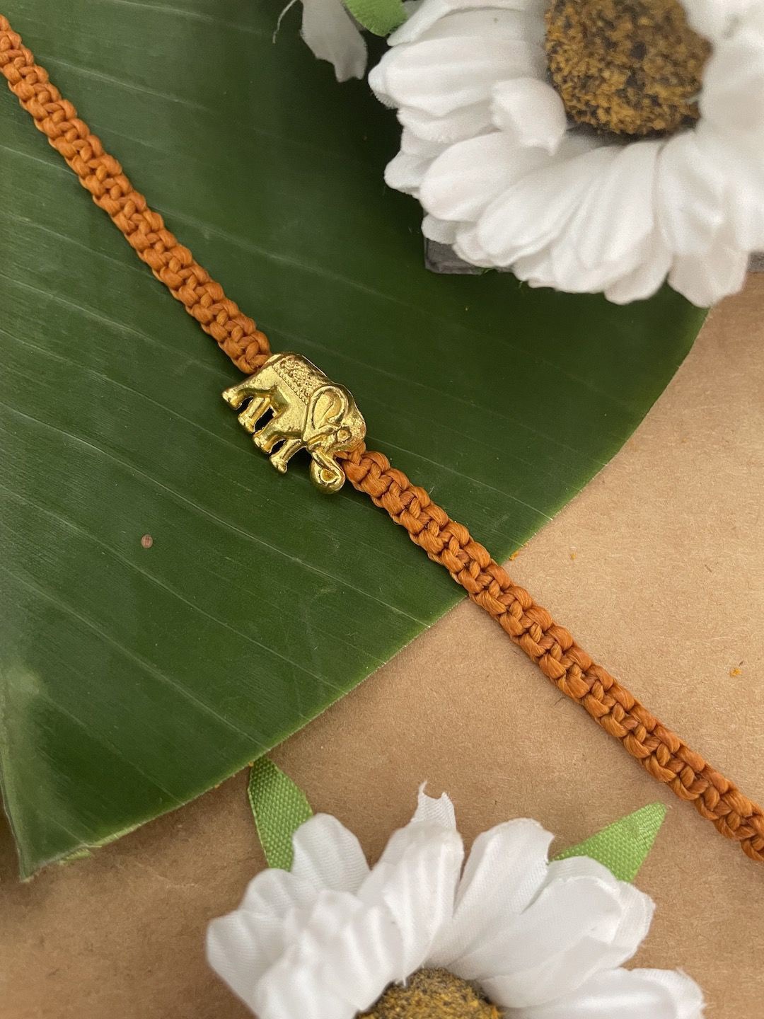 

Digital Dress Room Gold Plated Elephant Rakhi Bracelet, Brown