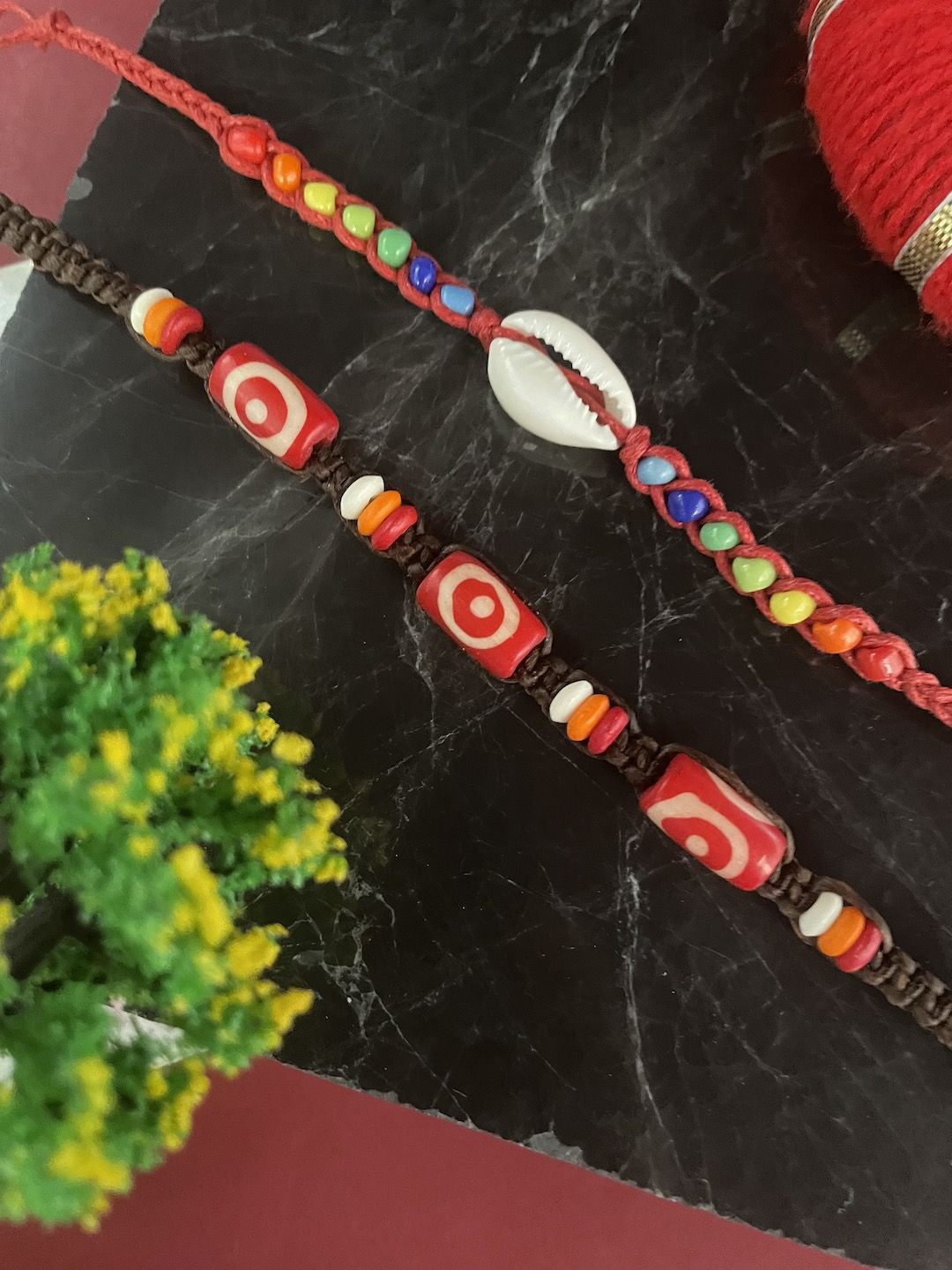 

Digital Dress Room Set Of 2 Beaded Thread Rakhis, Black