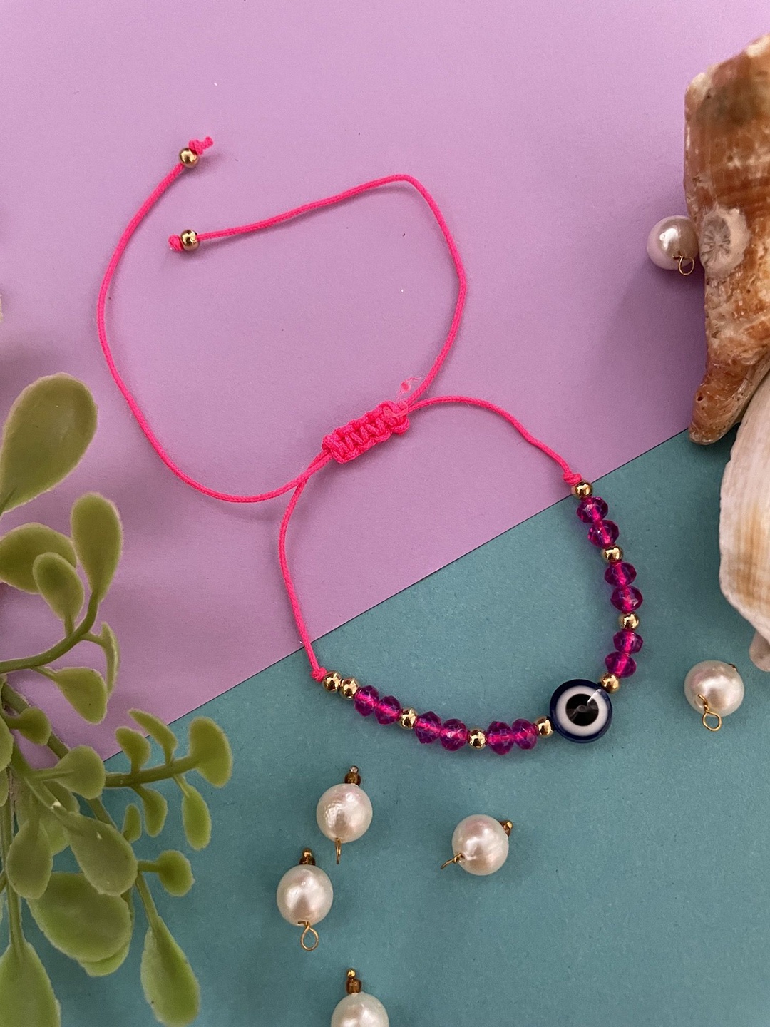 

Digital Dress Room Evil Eye Beaded Bracelet Rakhi With Roli Chawal, Pink