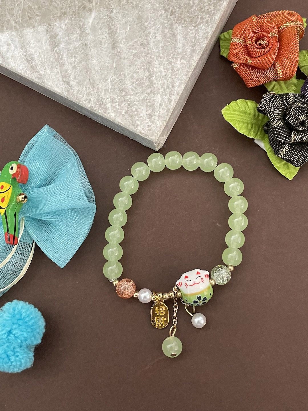 

Digital Dress Room Beaded Charm Bracelete Rakhi With Roli Chawal, Green