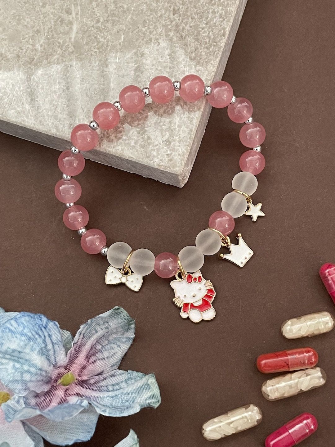 

Digital Dress Room Charms Stone Elasticated Bracelet Rakhi, Pink