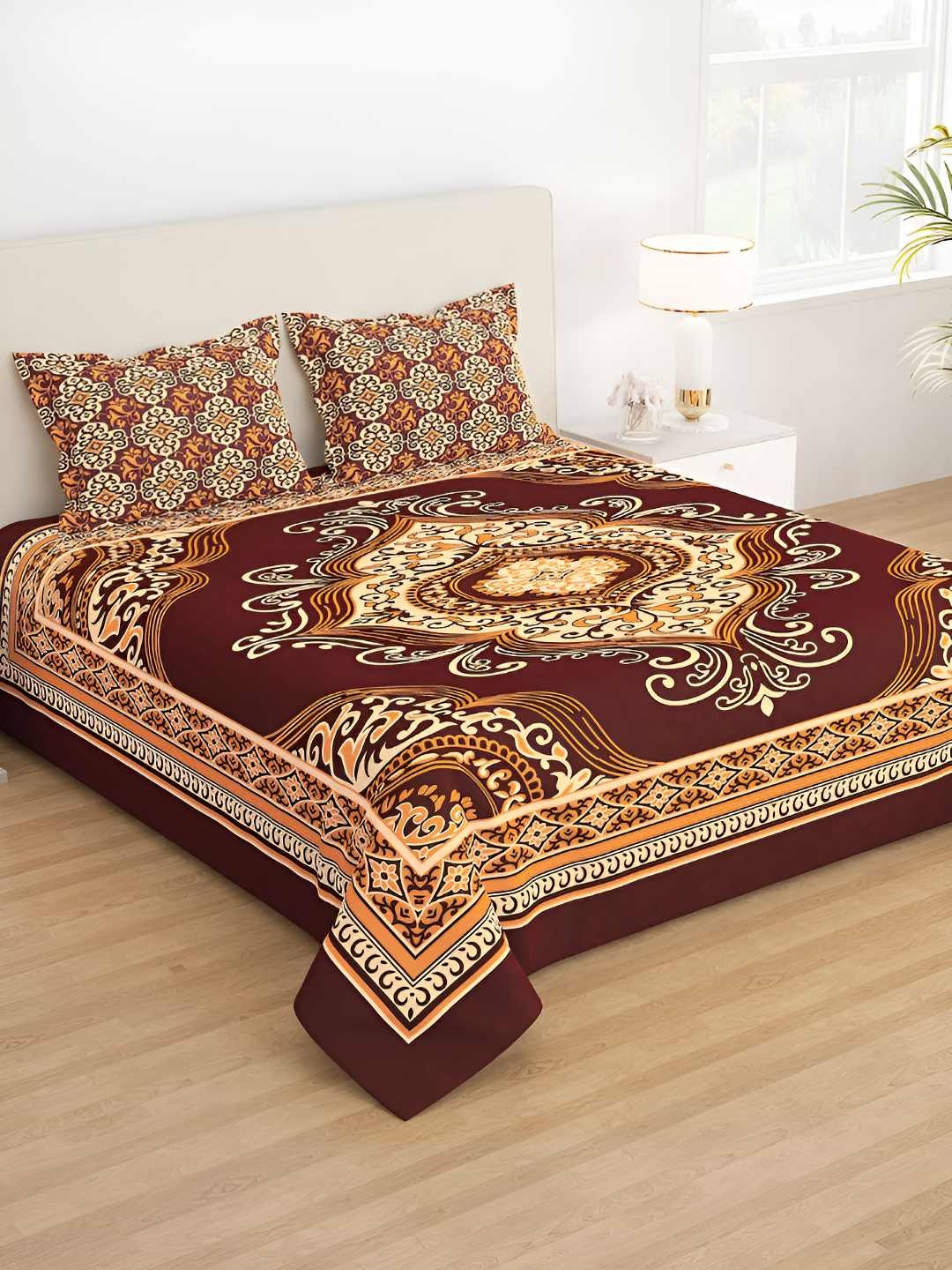 

Story@home Brown & Orange Ethnic Motifs 210 TC Queen Bedsheet with 2 Pillow Covers