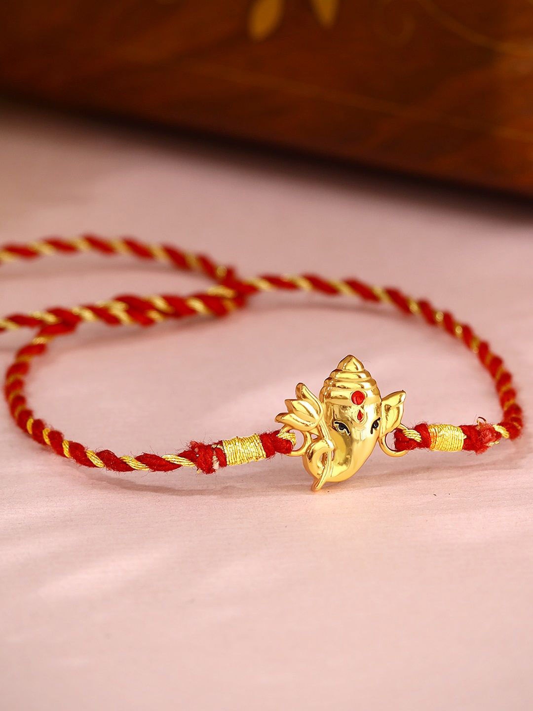 

GIVA 925 Silver Gold-Plated Bala Ganpati Rakhi With Roli Chawal