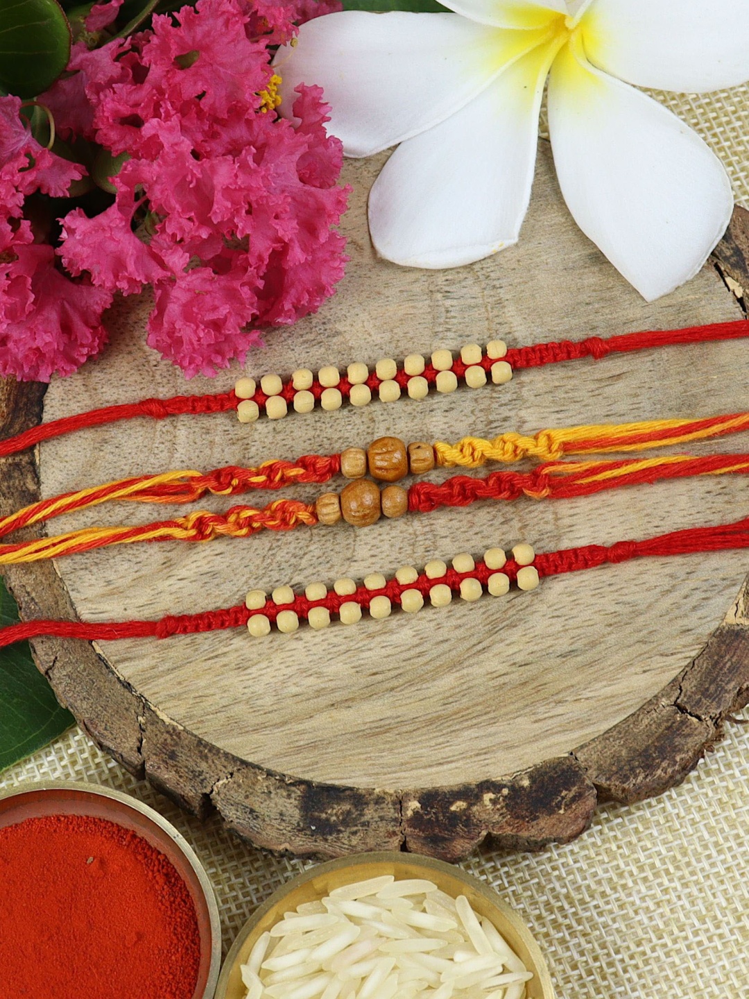 

Asthetika Set Of 4 Beaded Thread Rakhis With Roli Chawal, Red