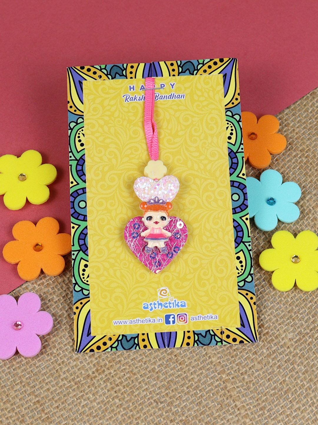 

Asthetika Little Doll Lumba Rakhi With Roli Chawal, Pink