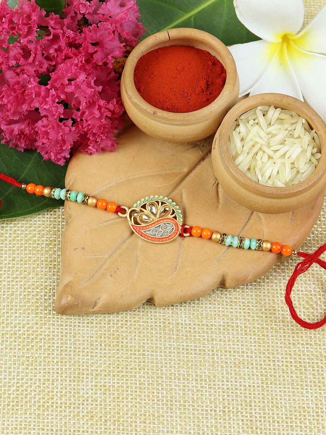 

Asthetika Stone Studded & Beaded Meenakari Thread Rakhi With Roli Chawal, Orange