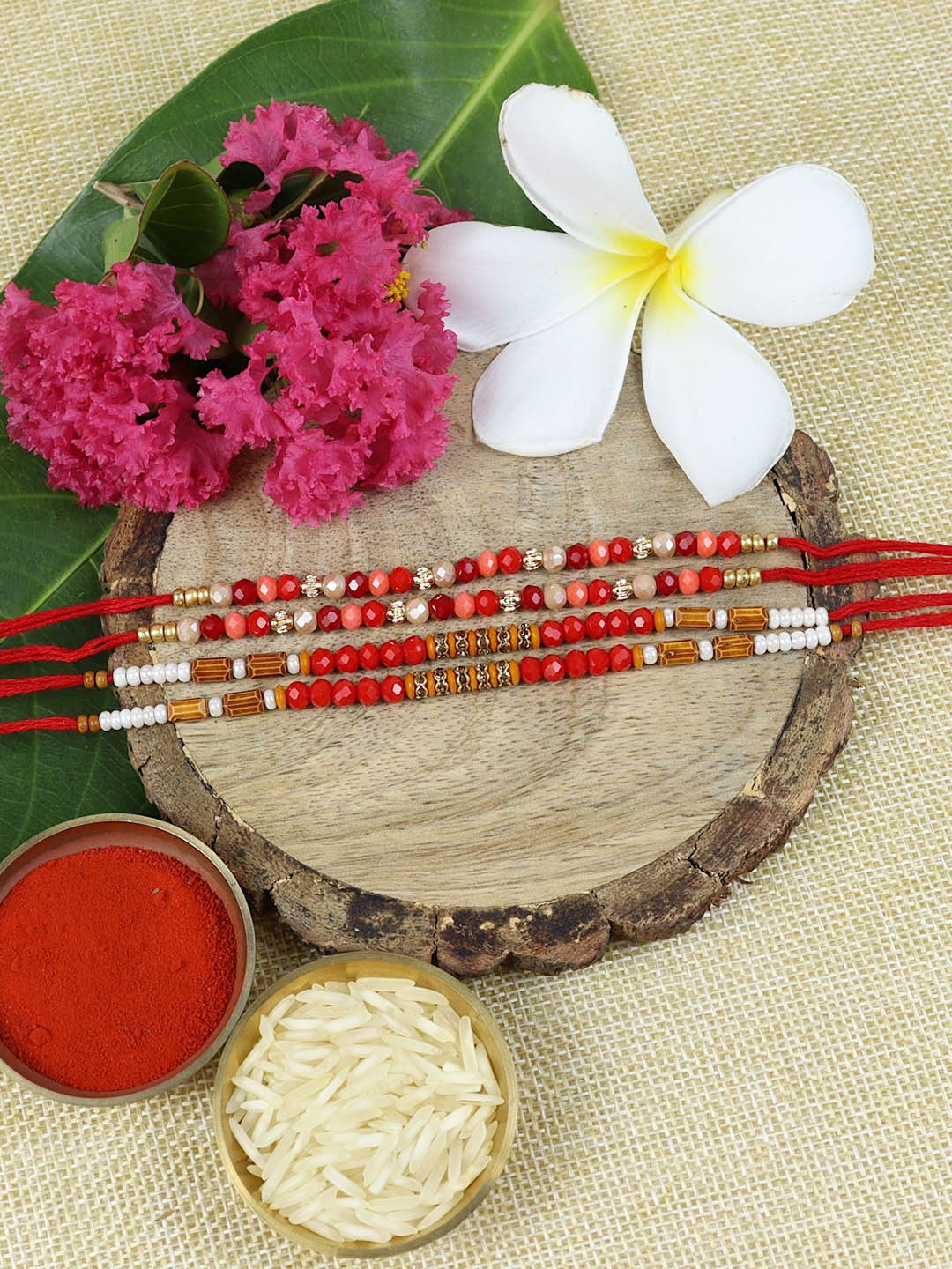 

Asthetika Set of 4 Beaded Thread Rakhis with Roli Chawal, Red