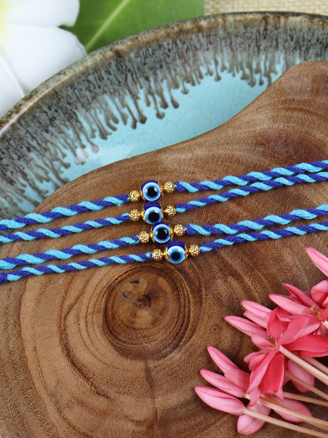 

Asthetika Set of 4 Beaded Thread Rakhis with Roli Chawal, Blue