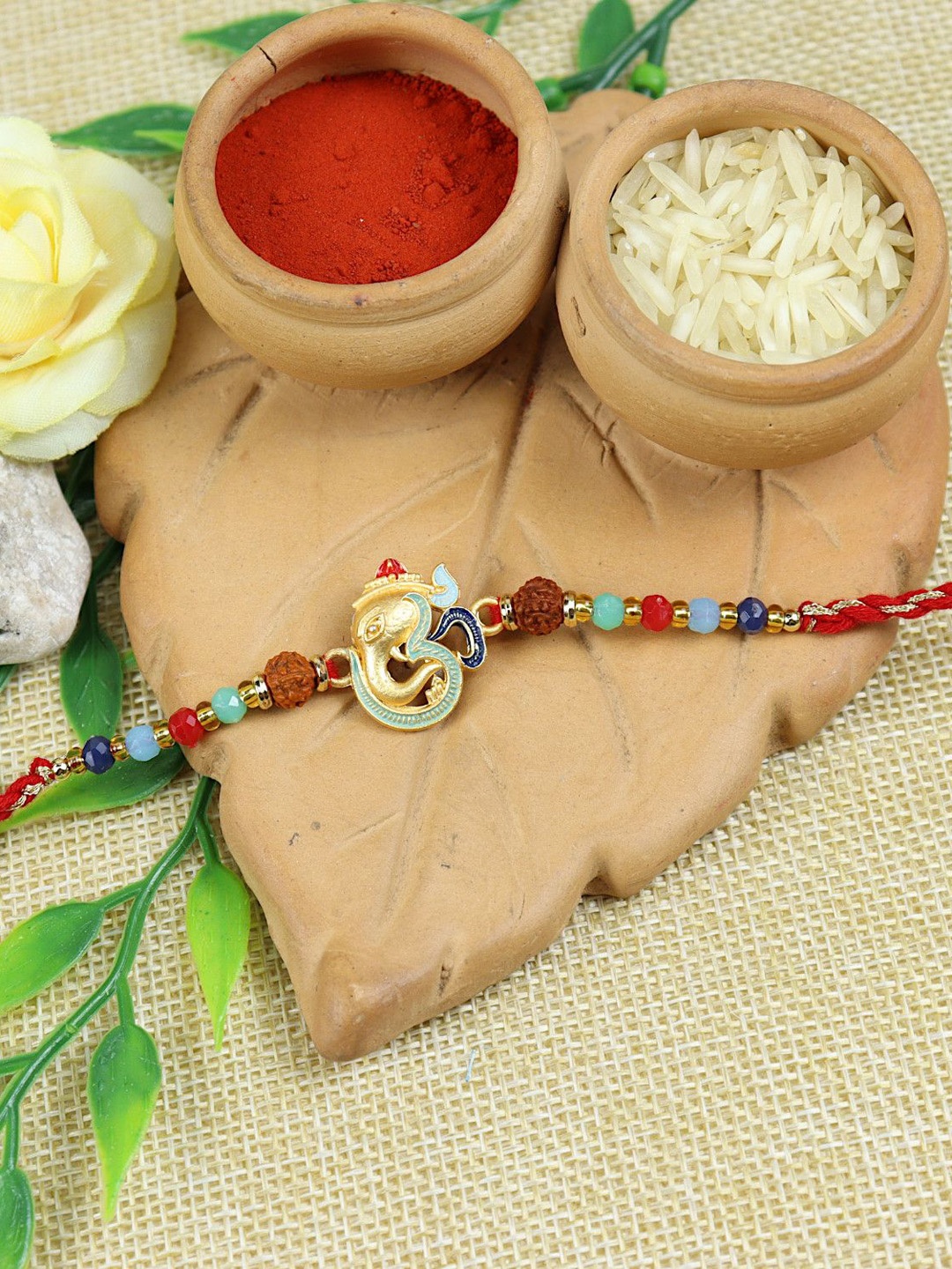 

Asthetika Lord Ganesha Thread Rakhi with Roli Chawal, Red