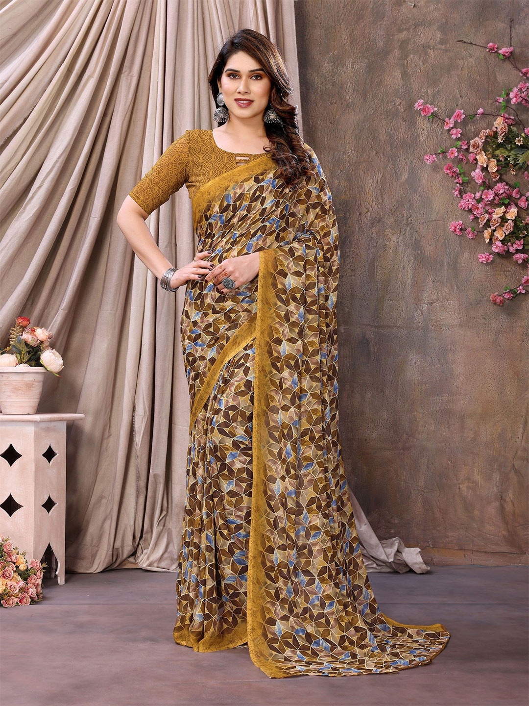 

Ambuja International Printed Geometric Saree, Mustard