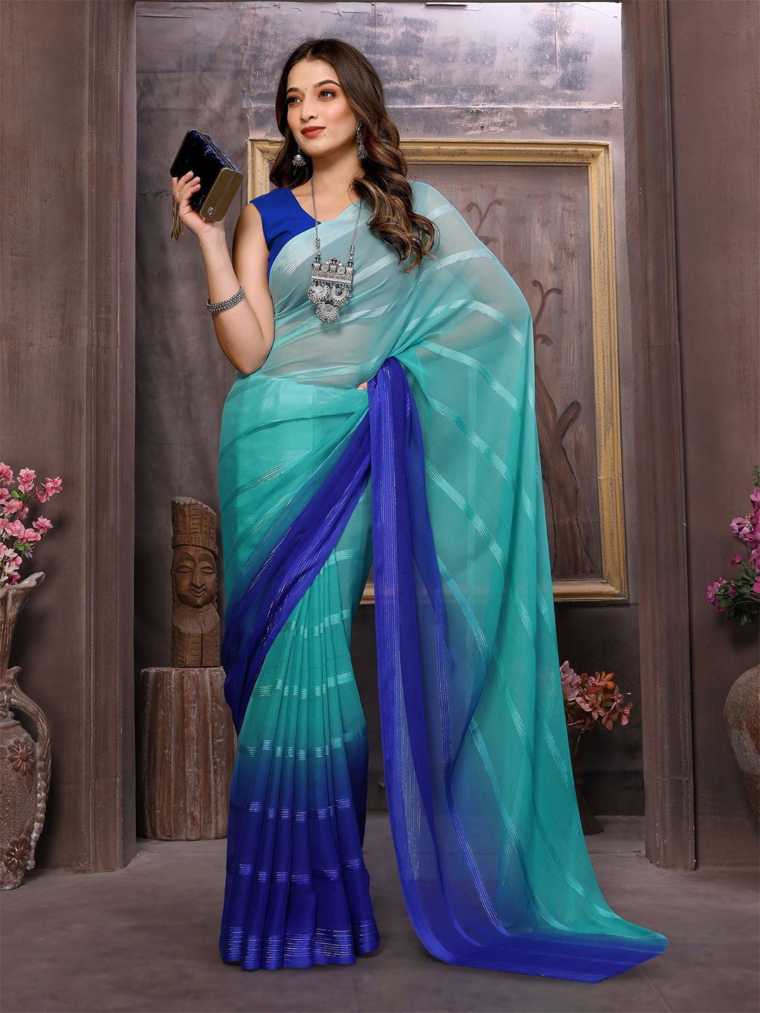 

Ambuja International Striped Zari Saree, Turquoise blue