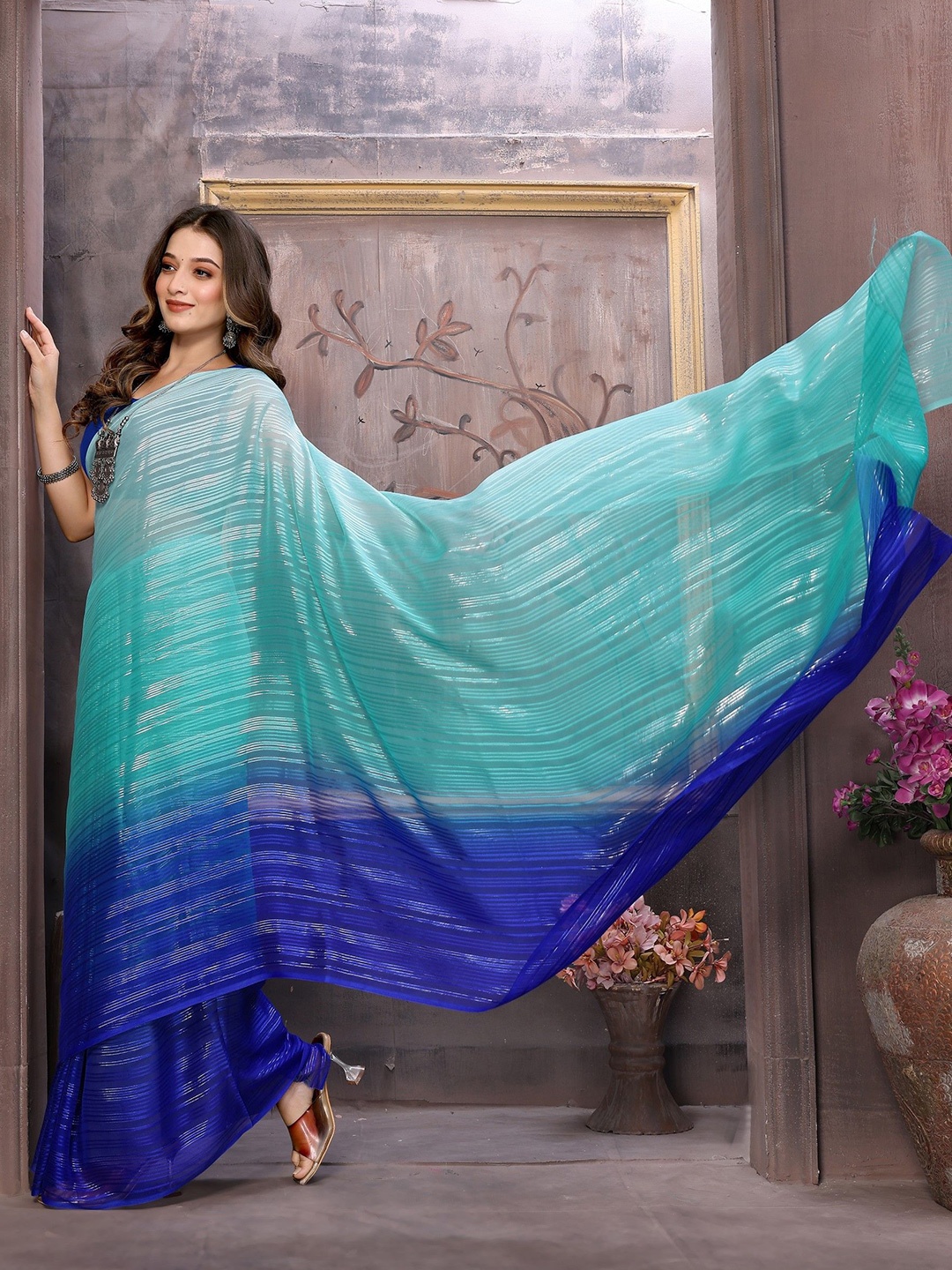 

Ambuja International Striped Printed Saree, Turquoise blue