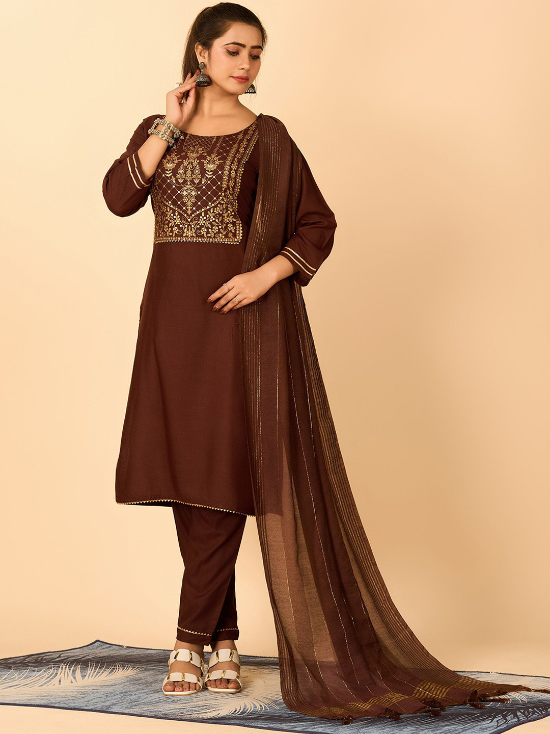 

A.V.M Prints Floral Printed Sequinned Pure Cotton Straight Kurta With Trousers & Dupatta, Coffee brown