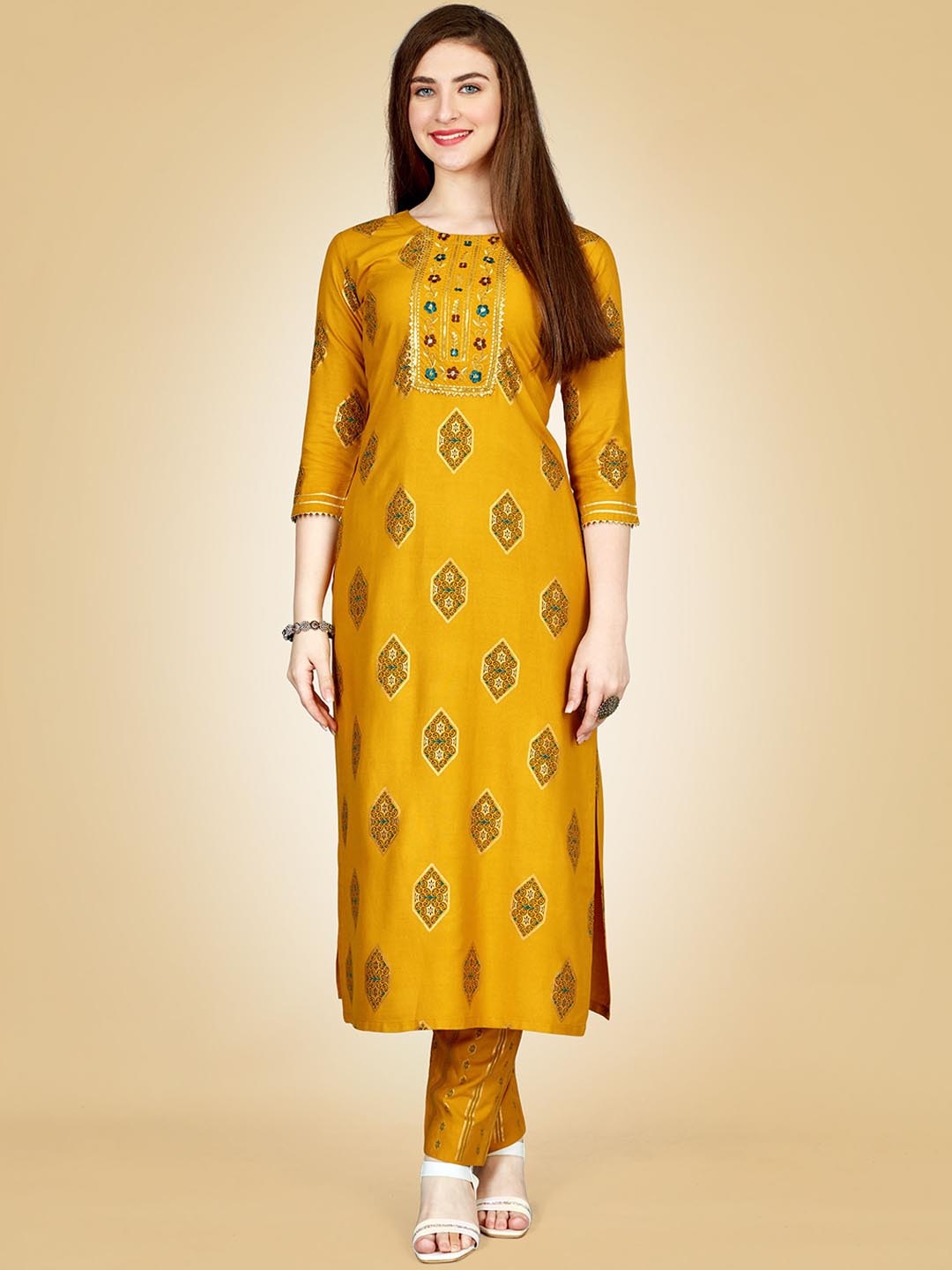 

Rujave Floral Printed Thread Work Straight Kurta With Churidar, Yellow