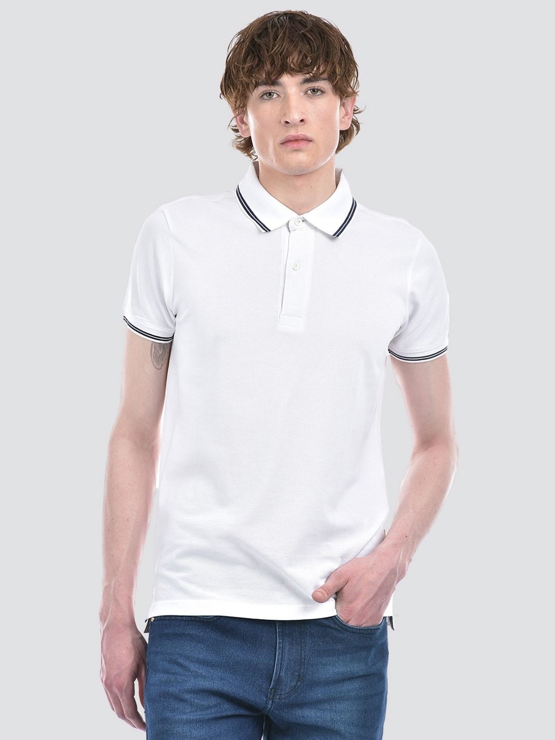 

Numero Uno Men Solid Polo Collar T-shirt, White