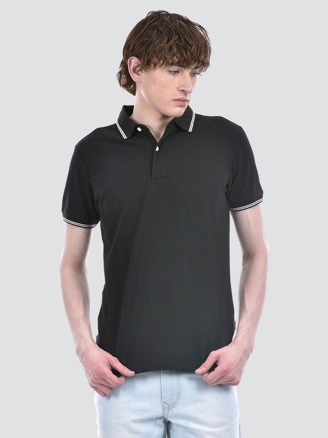 

Numero Uno Men Solid Polo Collar T-shirt, Black