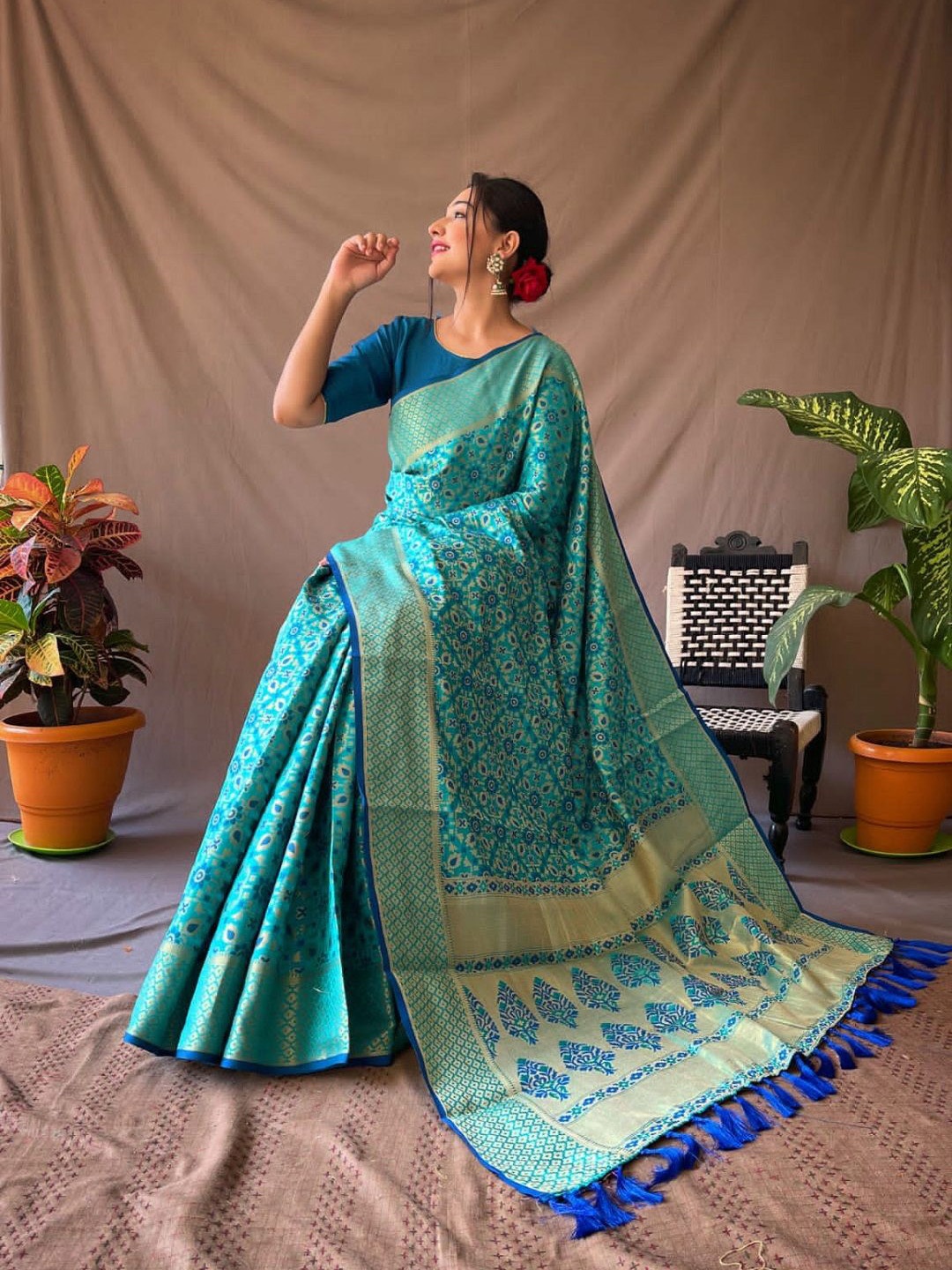 

Iris Woven Design Zari Patola Saree, Turquoise blue