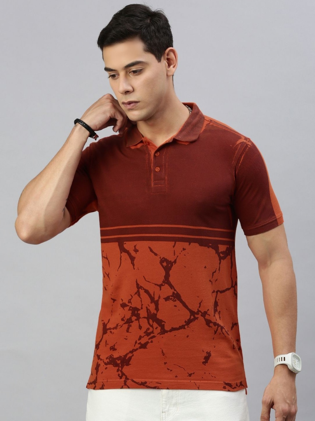 

Huetrap Men Abstract Printed Polo Collar T-shirt, Orange