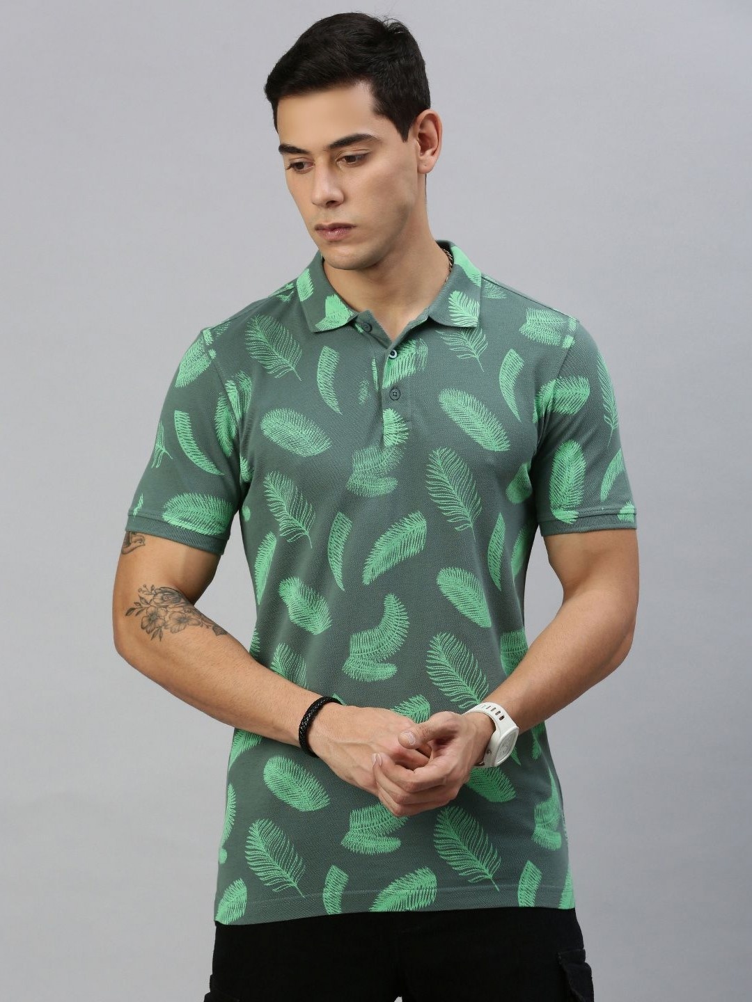 

Huetrap Men Abstract Printed Polo Collar Pure Cotton T-shirt, Sea green