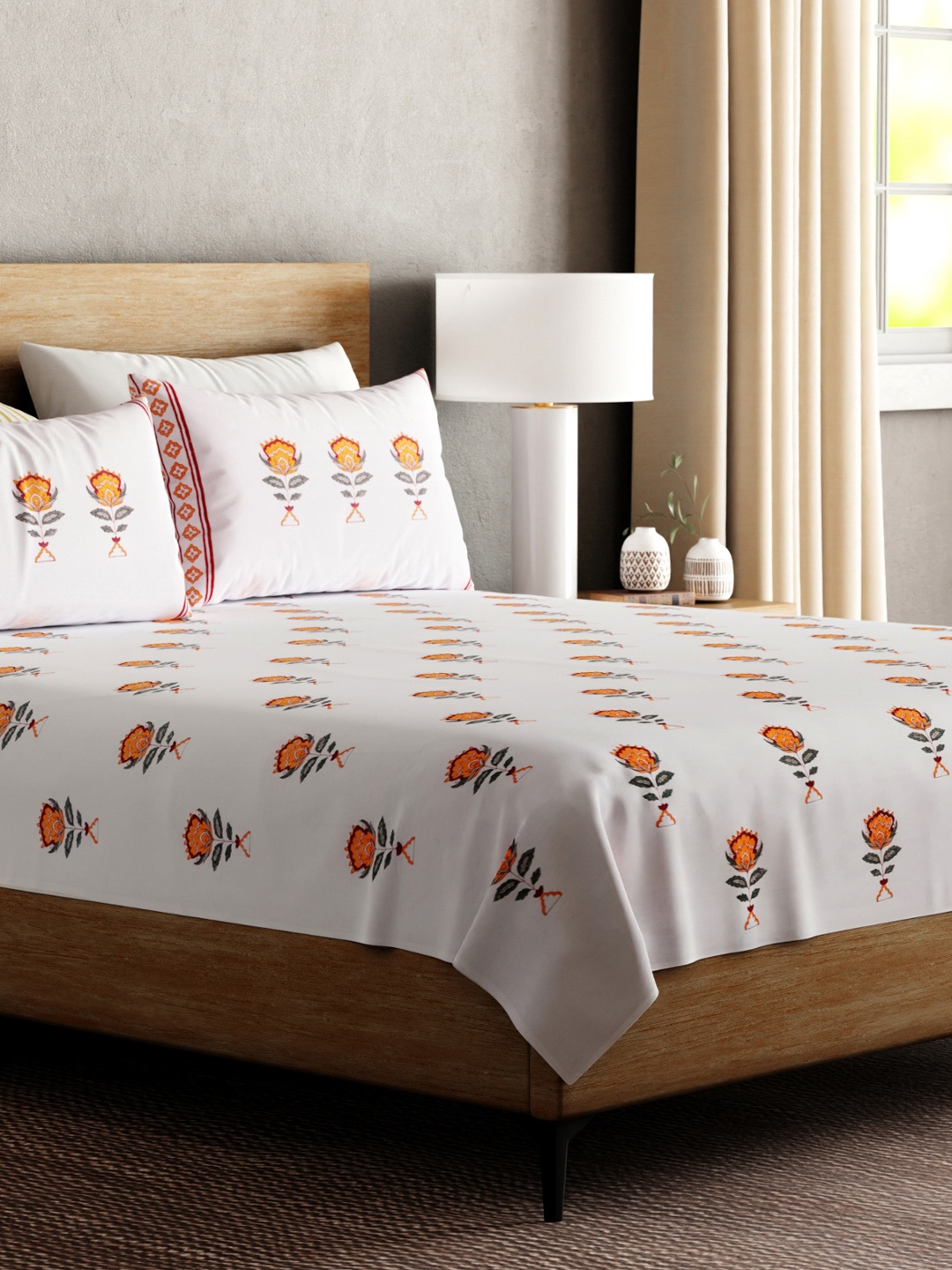 

Eyaas Orange & White Floral 200 TC Cotton King Bedsheet With 2 Pillow Covers