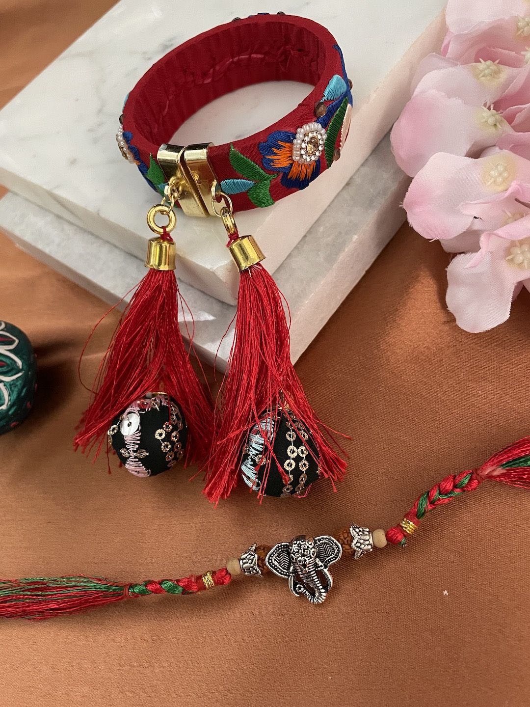 

Digital Dress Room Set Of 2 Ganesha & Bangle Lumba Rakhi, Red