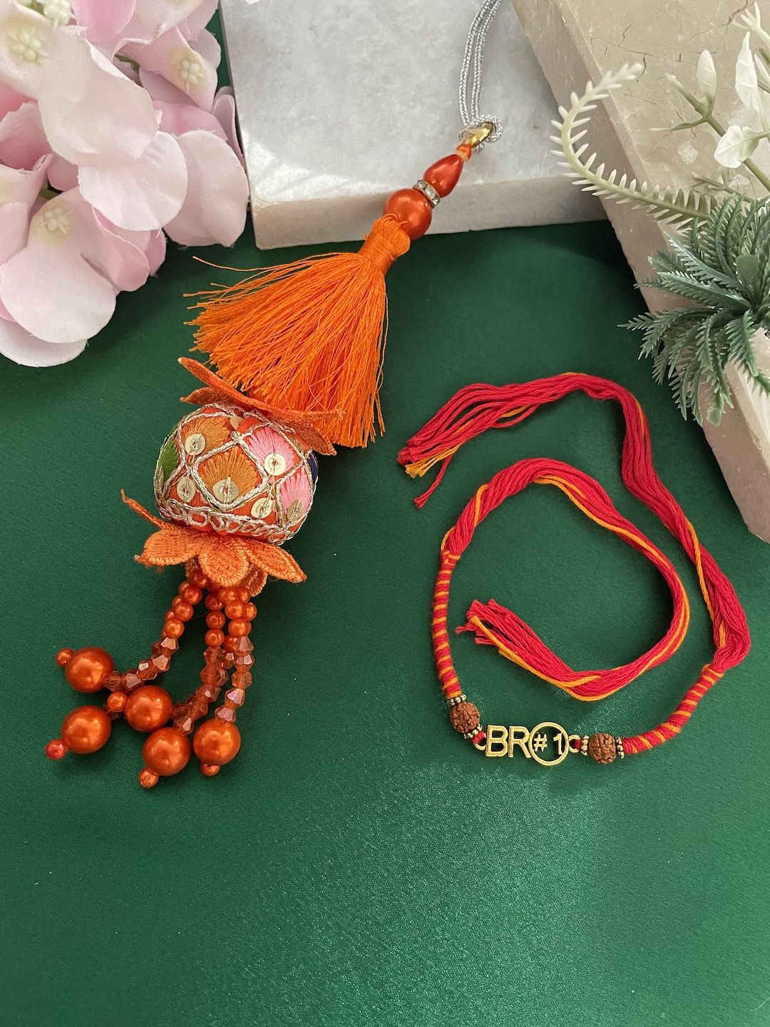 

Digital Dress Room Set Of 2 Flower Lumba Thread Rakhi, Orange