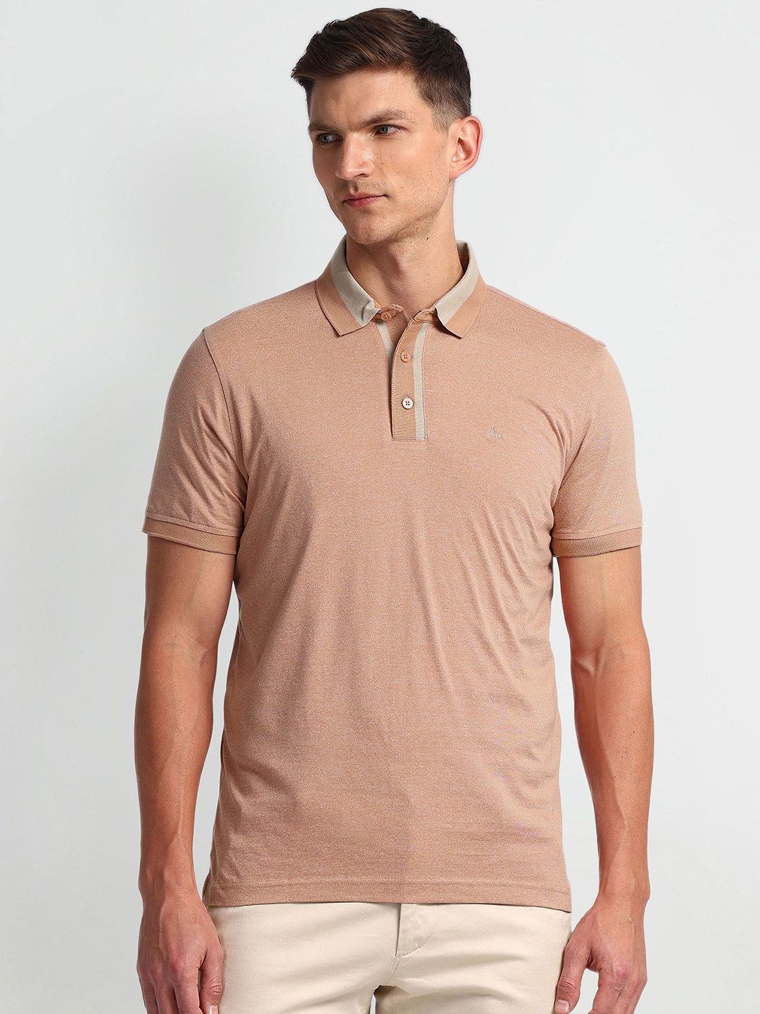 

Arrow Men Solid Polo Collar T-shirt, Orange