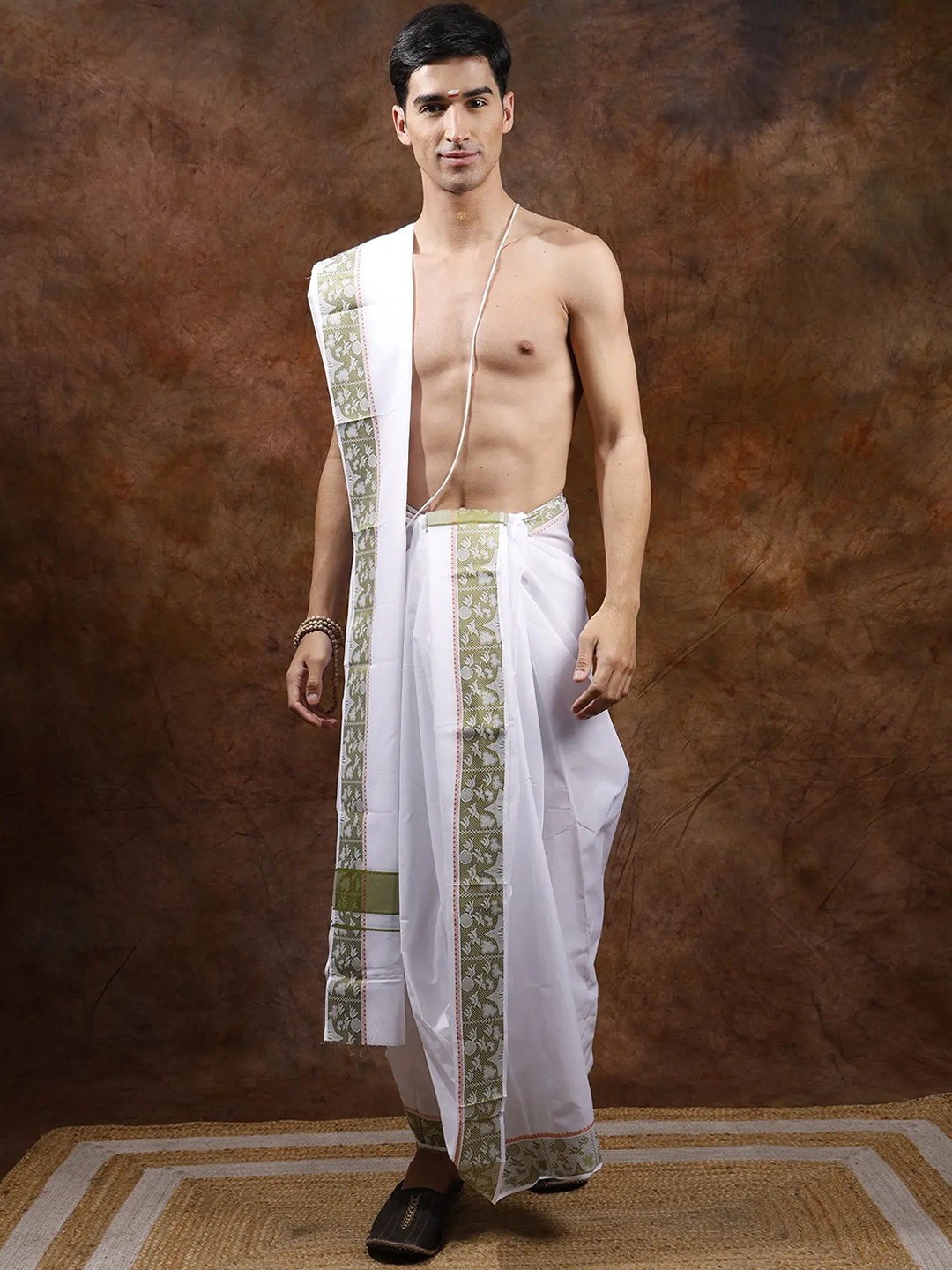 

Exotic India White and Olive Dhoti with Angavastram Set and Birds Woven on Border