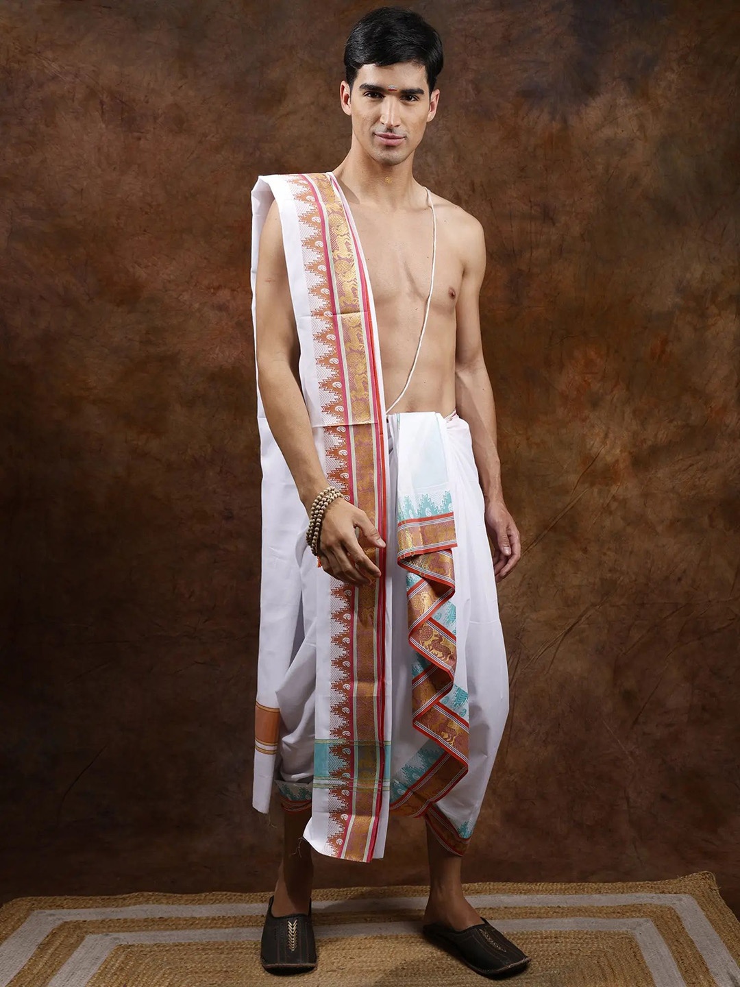 

Exotic India Pure Cotton Dhoti with Angavastram Set and Peacock & Deer Zari Woven Border, White