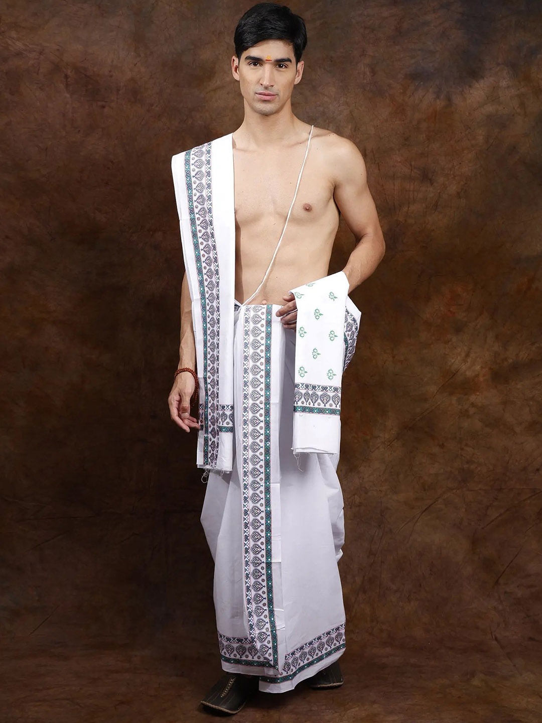 

Exotic India Star White Pure Cotton Dhoti and Angavastram Set with Printed Border