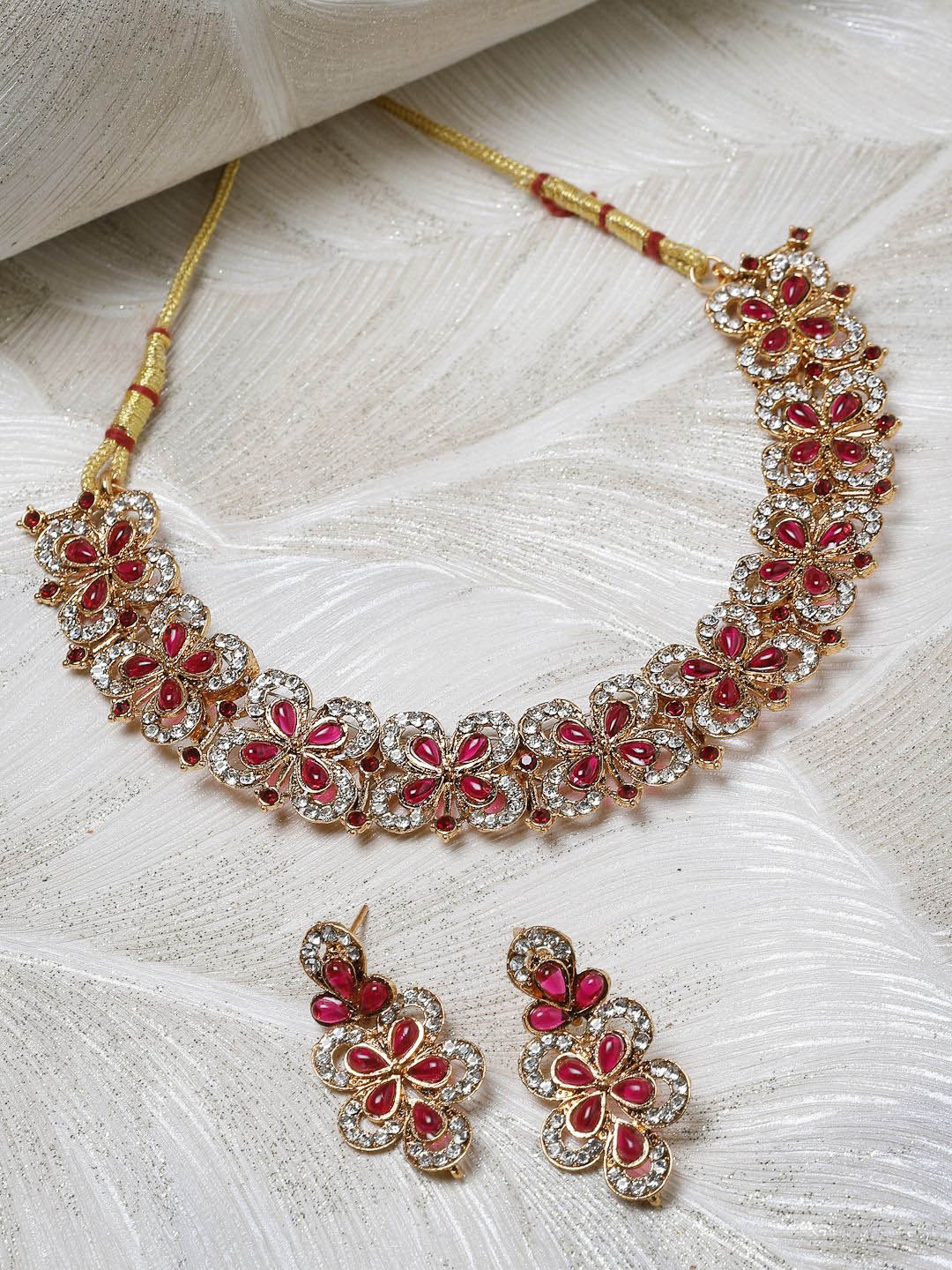 

Sukkhi Gold Plated American Diamond Studded Jewellery Set