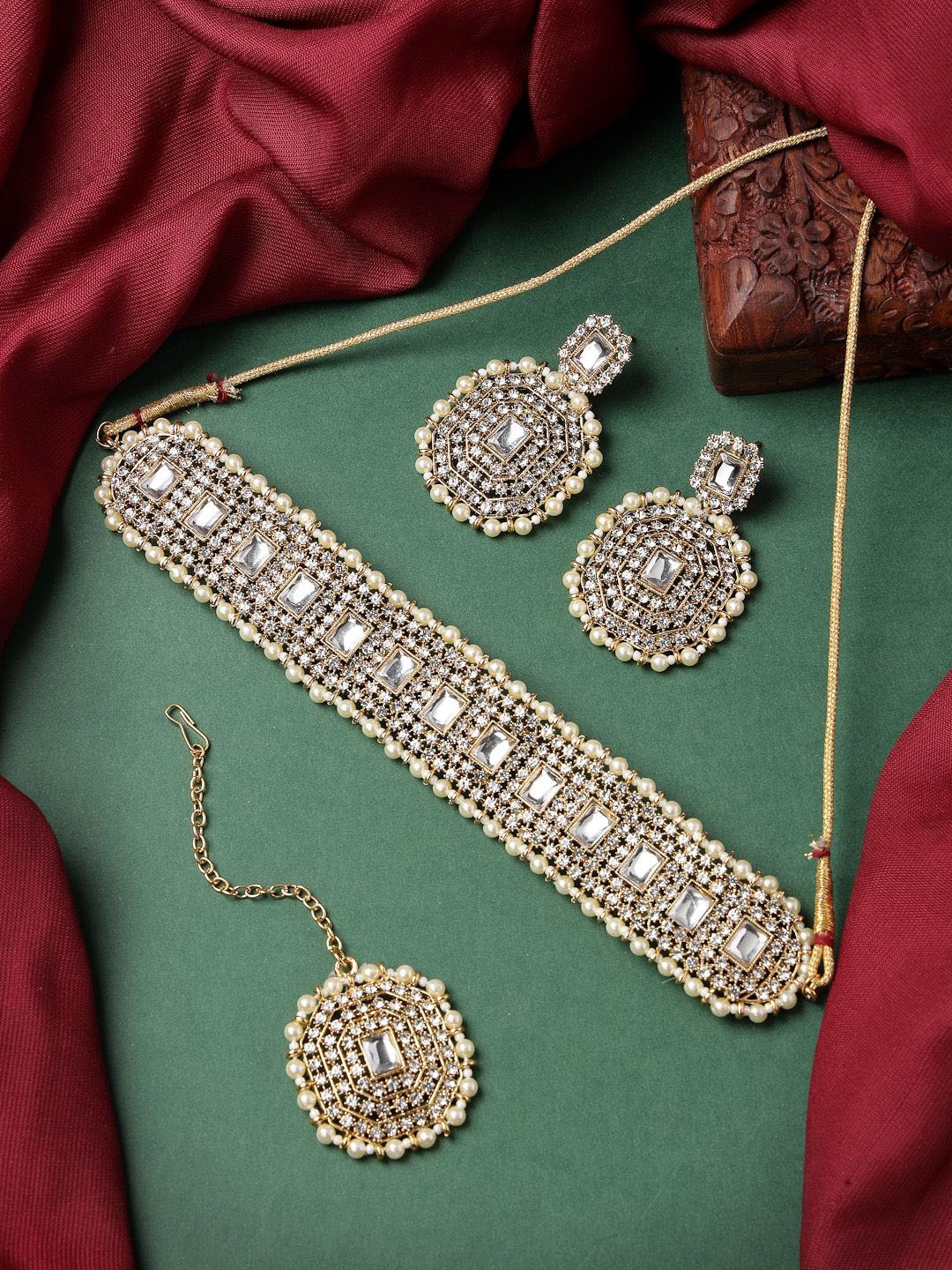 

Sukkhi Gold-Plated Kundan Stone Studded Beaded Jewellery Set