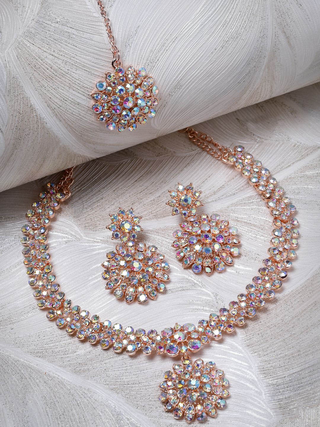 

Sukkhi Rose Gold Plated Stone Studded Jewellery Set