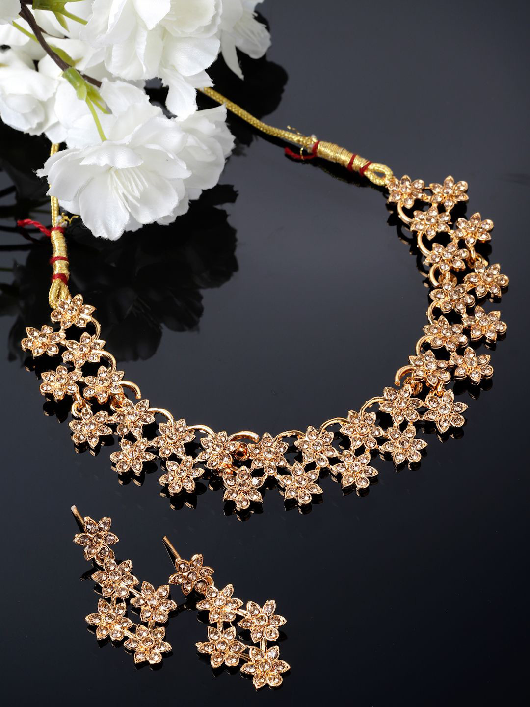 

Sukkhi Gold Plated American Diamond Studded Jewellery Set