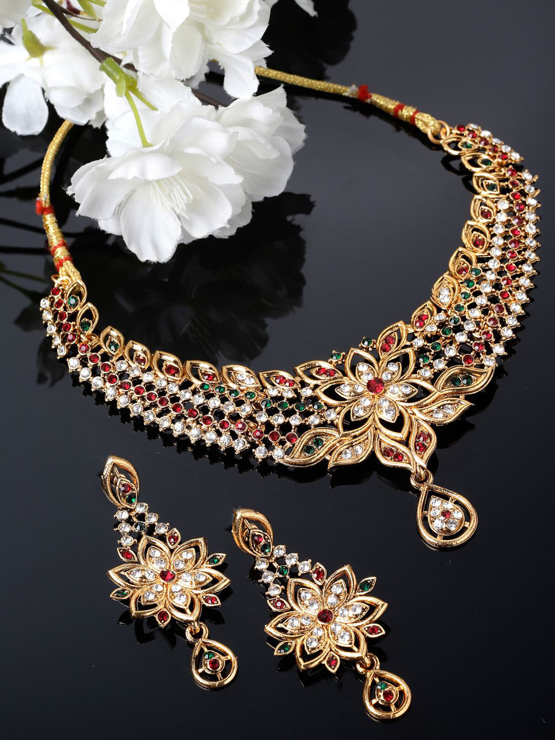 

Sukkhi Gold Plated American Diamond Stone Studded Jewellery Set