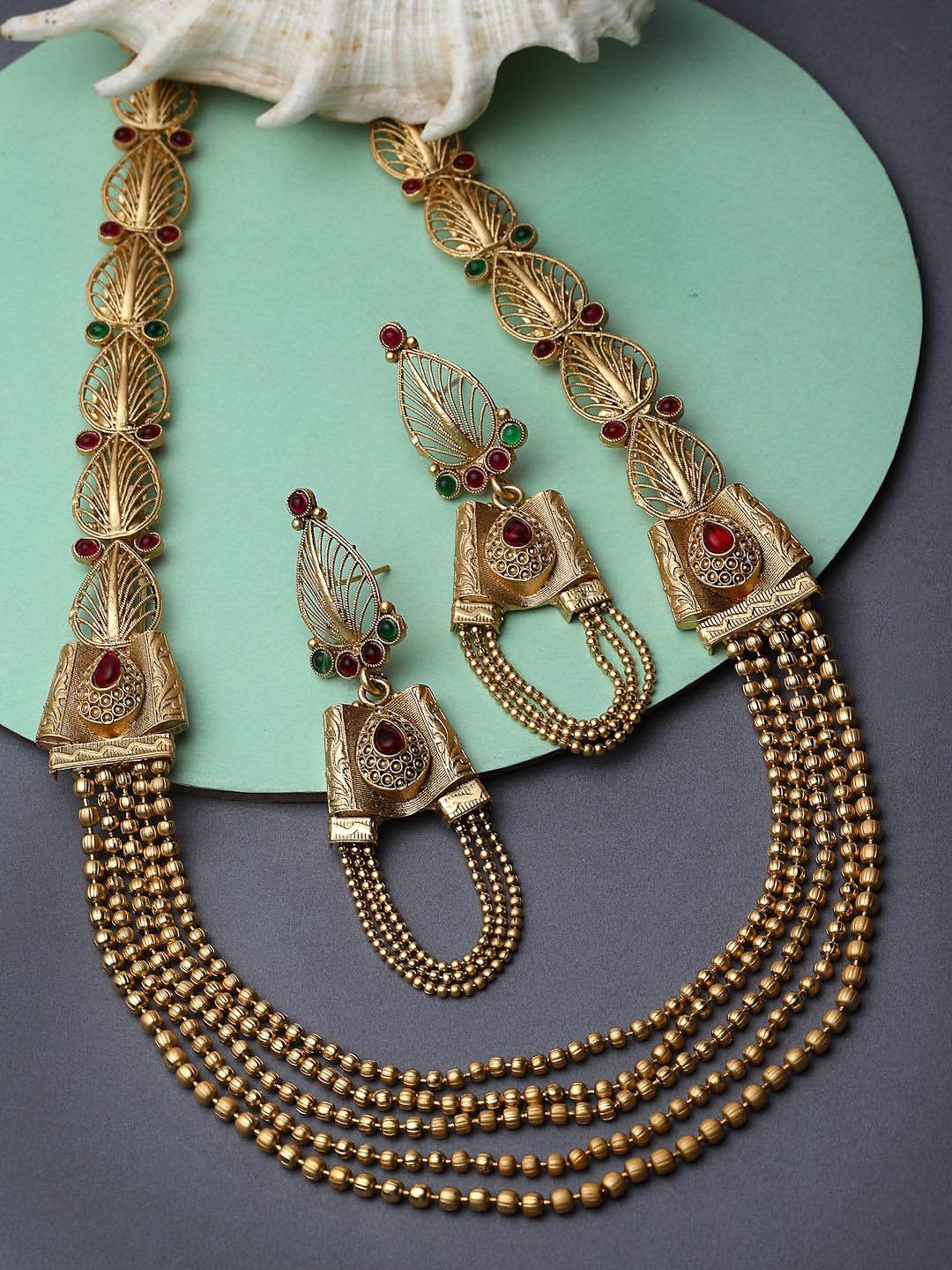 

Sukkhi Gold Plated Layered Kundan Studded Jewellery Set