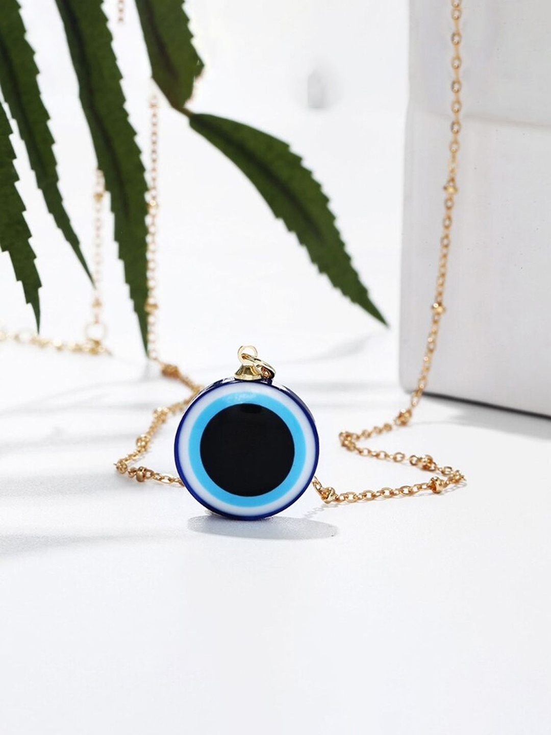 

Unwind by Yellow Chimes Gold-Plated Evil Eye Circular Pendant With Chain