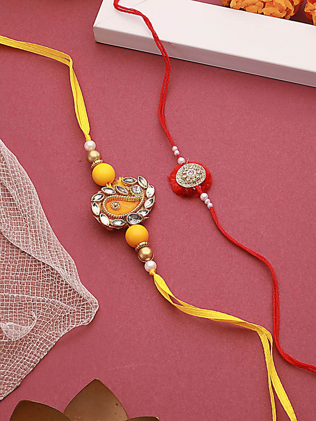 

Jazz and Sizzle Set Of 2 Beaded Thread Rakhi, Yellow
