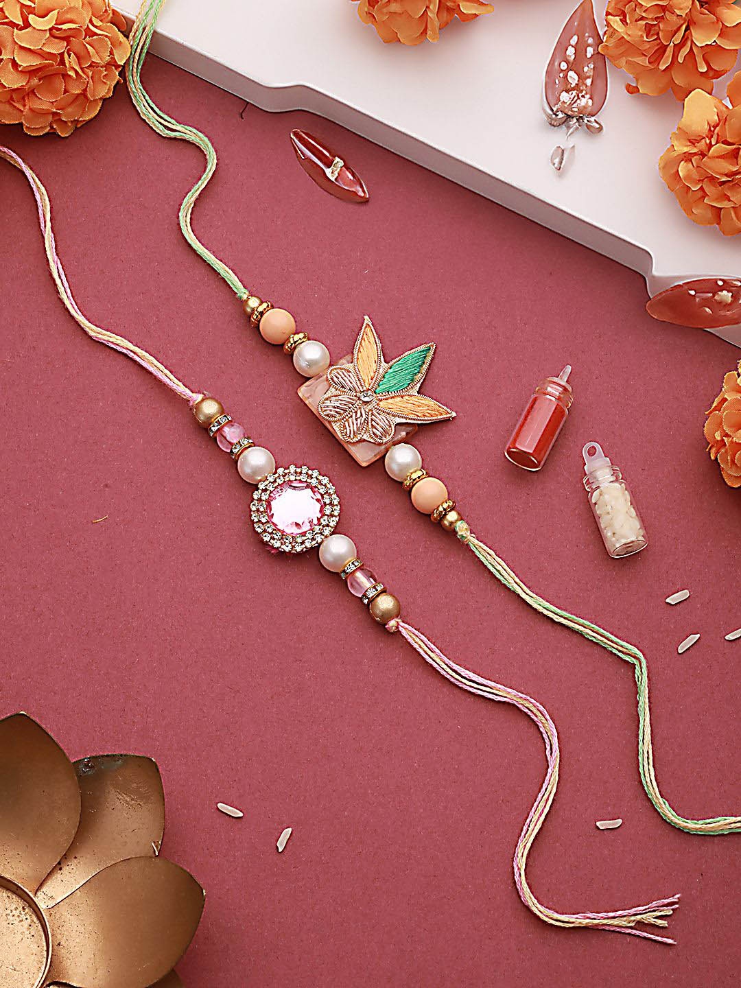 

Jazz and Sizzle Set of 2 Floral Stone Studded Rakhi, Pink