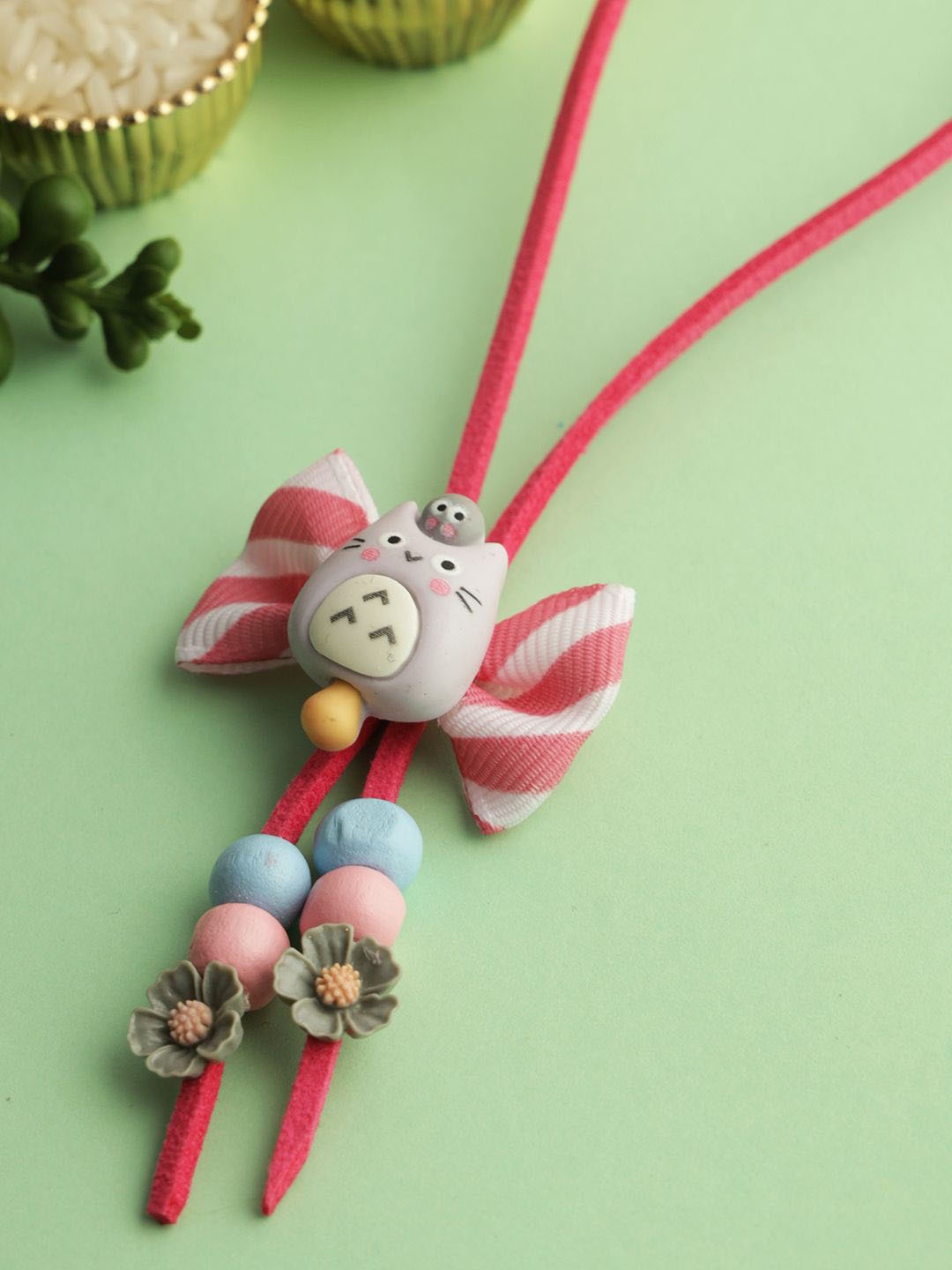 

Aapno Rajasthan Girls Bow Beaded Elasticated Rakhi, Pink