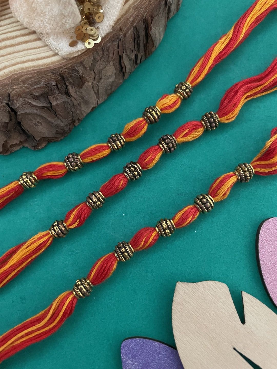 

Digital Dress Room Set of 3 Thread Rakhis, Red