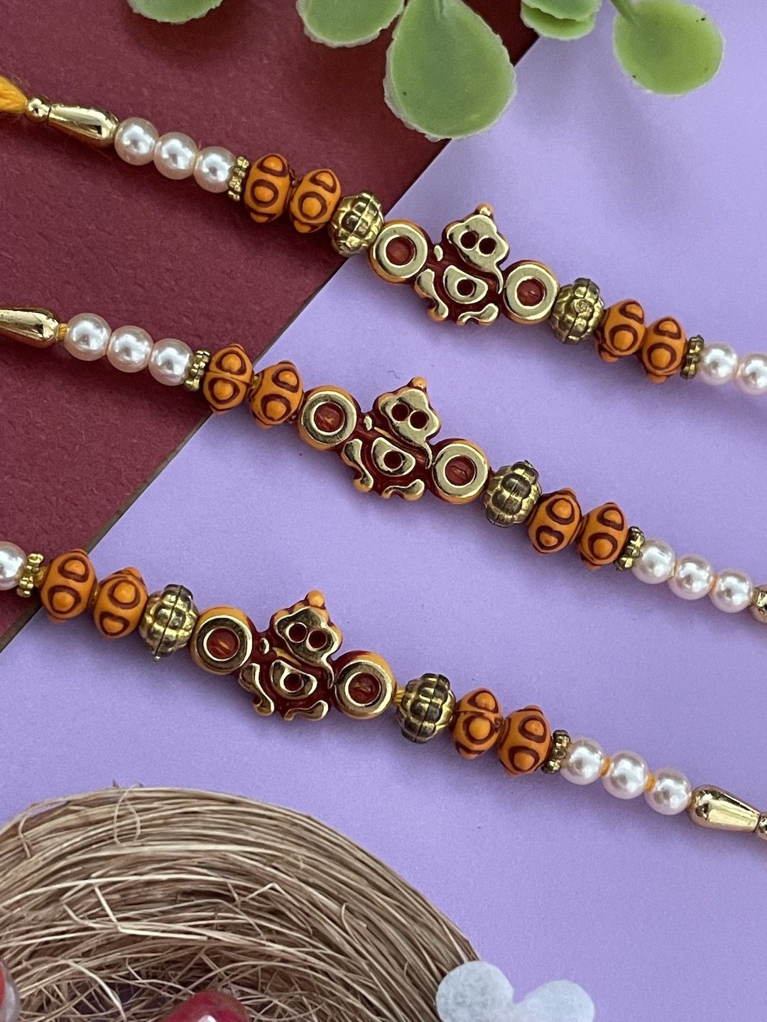 

Digital Dress Room Set Of 3 Pearls Rakhi, Yellow