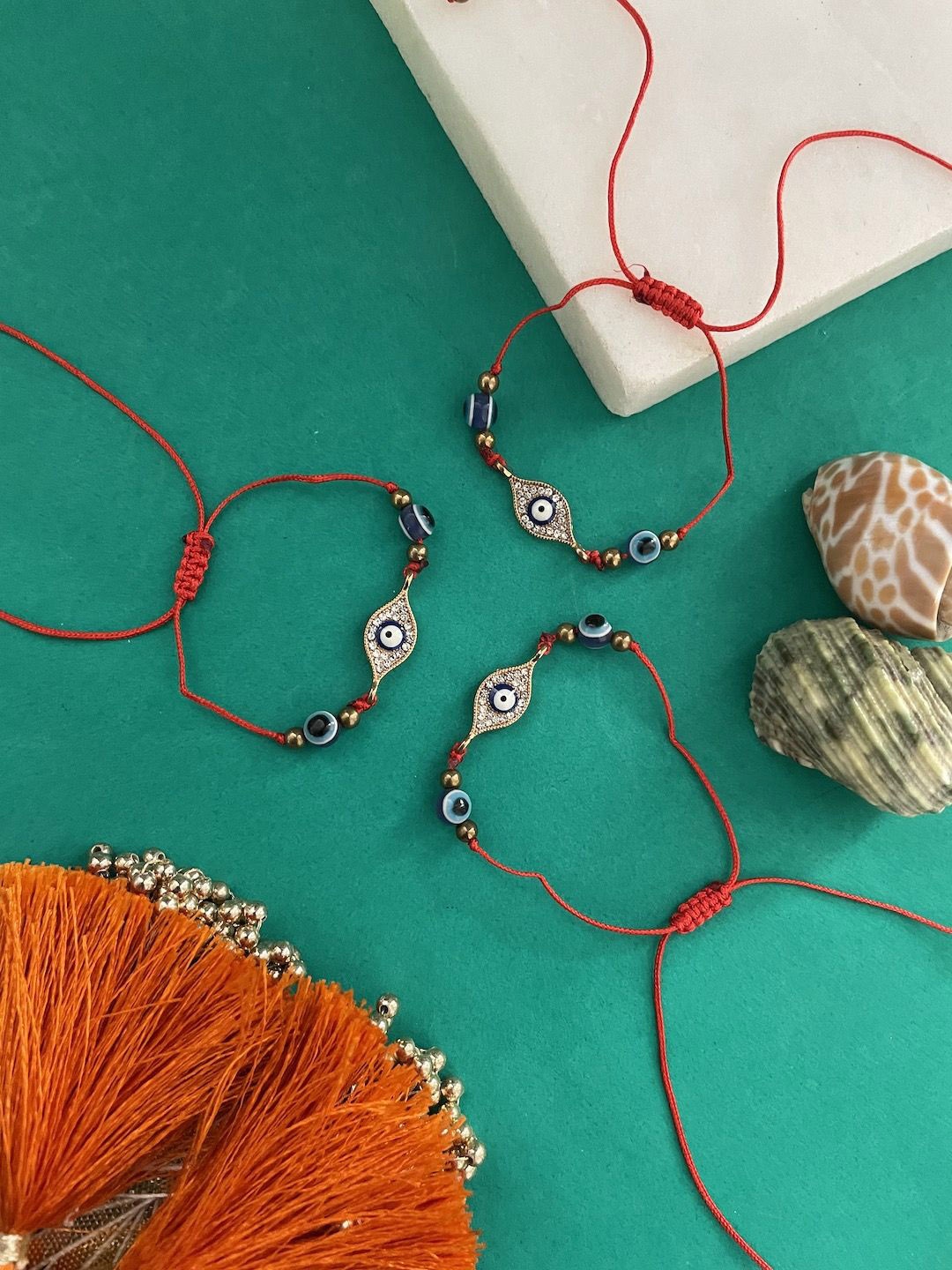 

Digital Dress Room Set Of 3 AD Evil Eye Thread Rakhi, Red