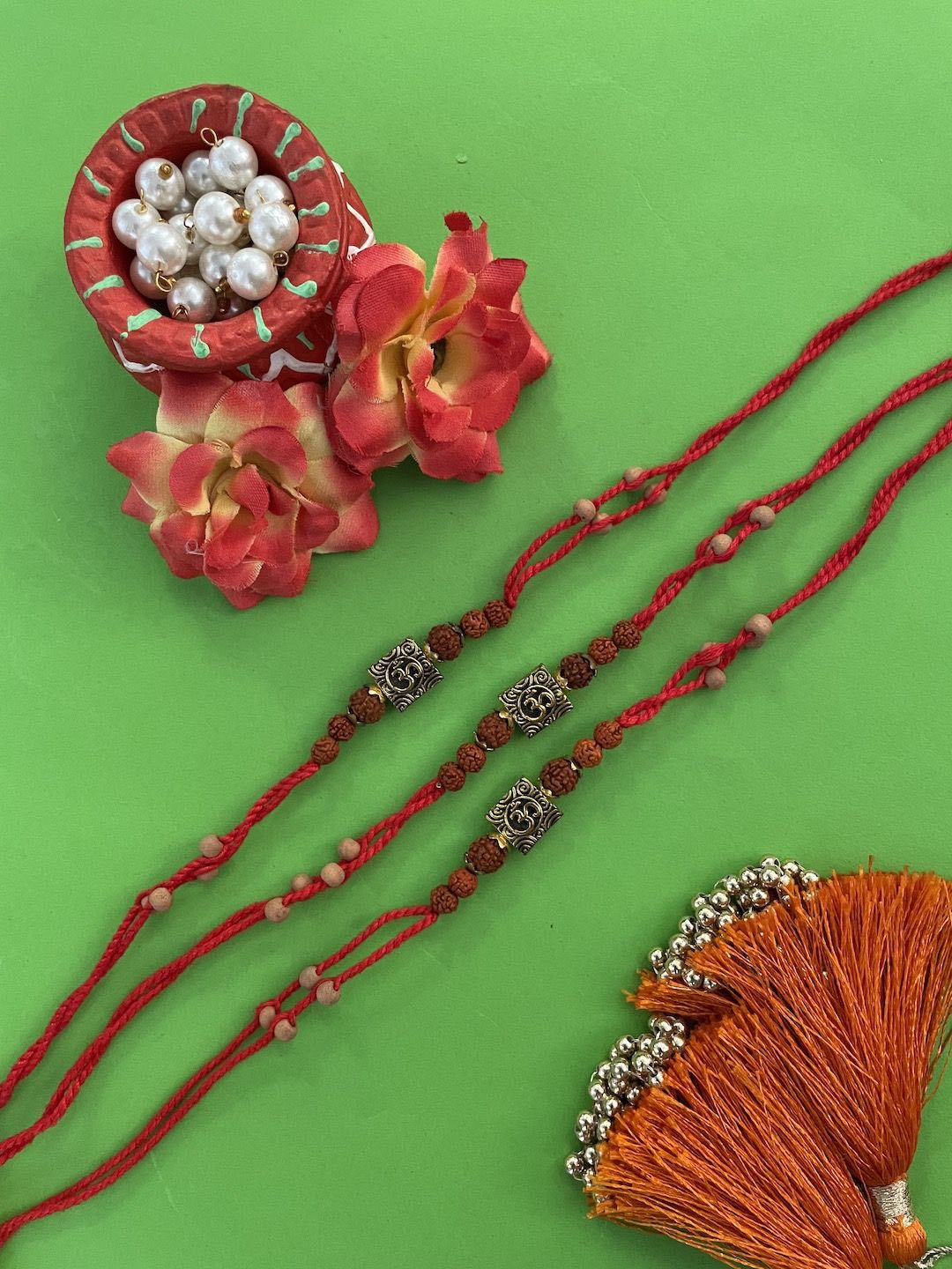 

Digital Dress Room Set Of 3 Om Designs & Rudraksh Thread Rakhi, Red