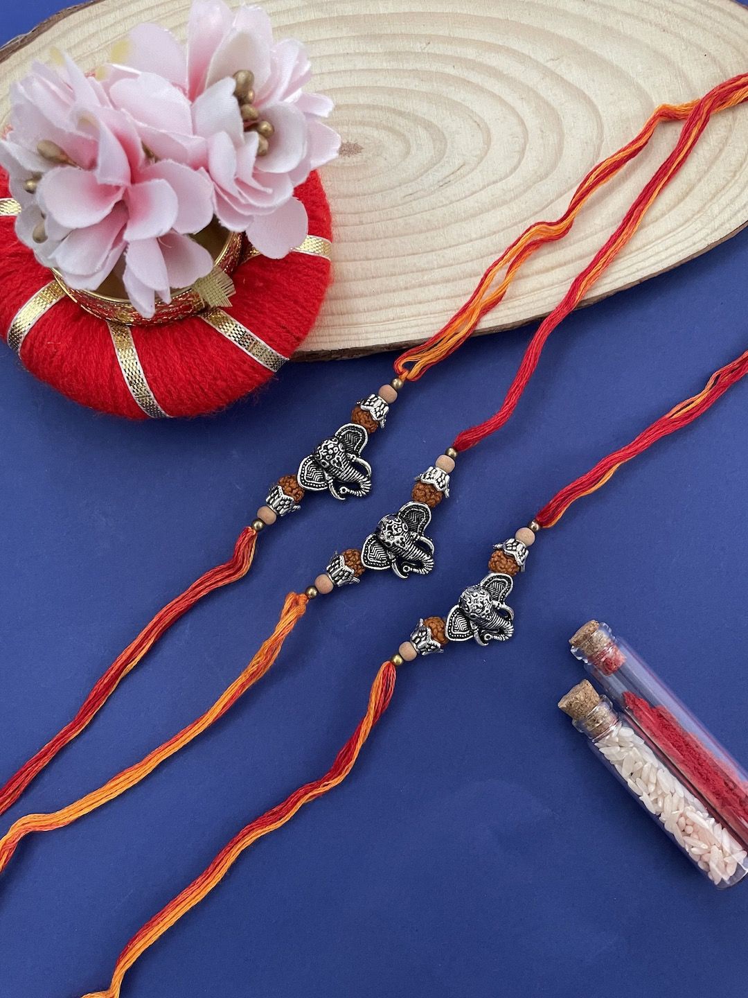 

Digital Dress Room Set of 3 Beaded Thread Rakhis, Red