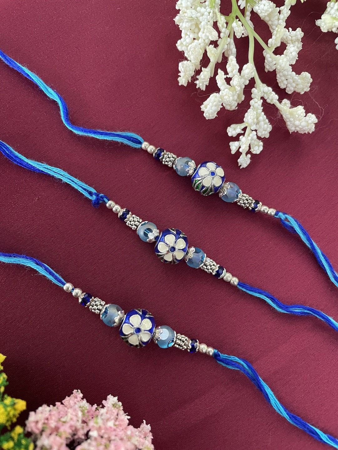 

Digital Dress Room Set of 3 Beaded Thread Rakhis, Blue